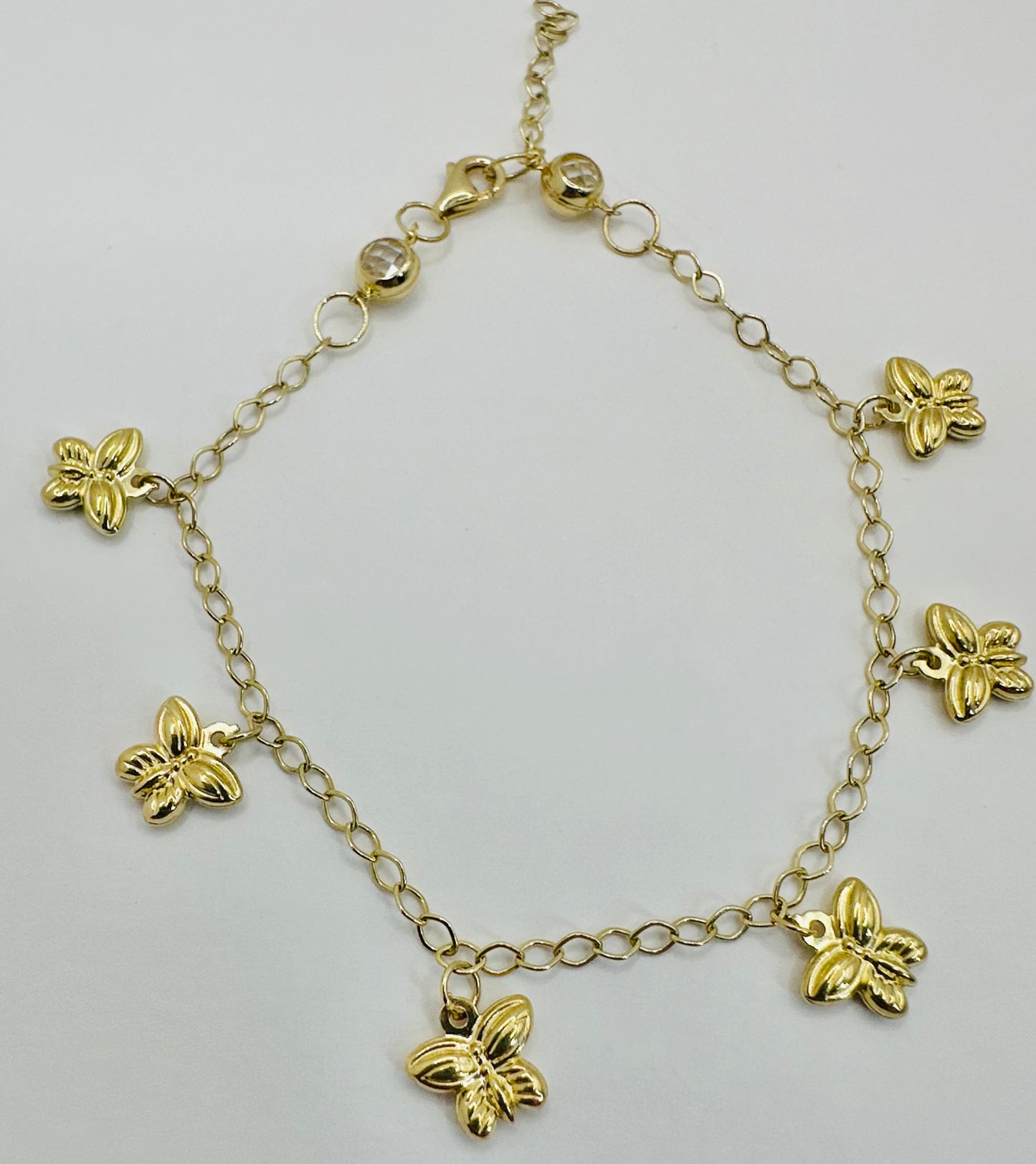 Manilla colgante mariposa 10 k